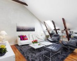 Contemporary style and cozy feeling under a sloped roof