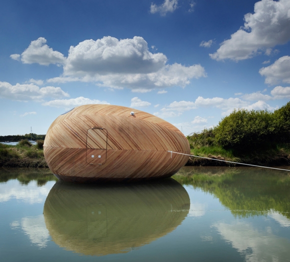 Traveling-Down-The-River-In-This-Egg-Boat-2