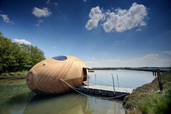 Traveling-Down-The-River-In-This-Egg-Boat-3