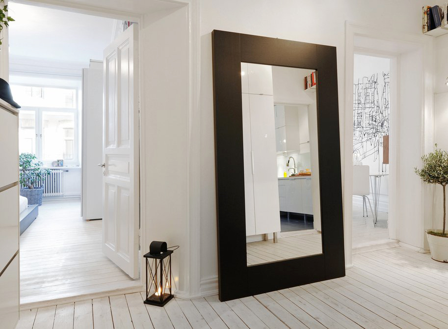 Huge Mirror In White Entrance Hall