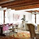 Wood Beams And Jewel Tones: A Rustic House