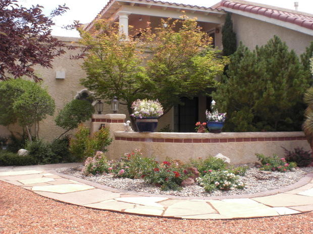 Contemporary Patio With Stone Paved Walk Way