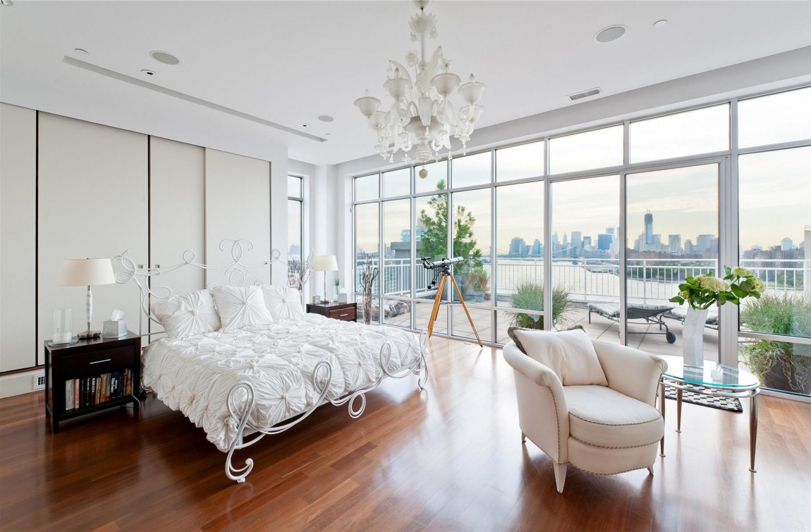 White Bedroom With Floor-To-Ceiling Windows And City View