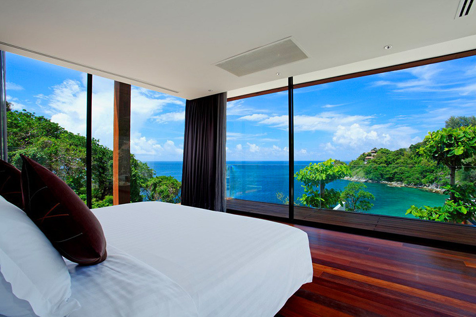 Tropical Bedroom With Floor-To-Ceiling Panoramic Wall