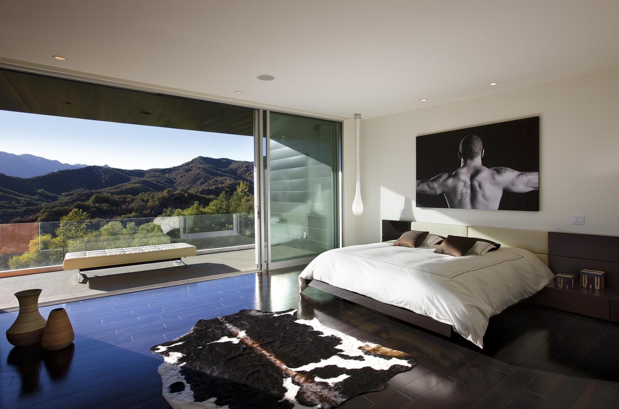 Bedroom Design With A Floor-To-Ceiling Windows And Mountain View