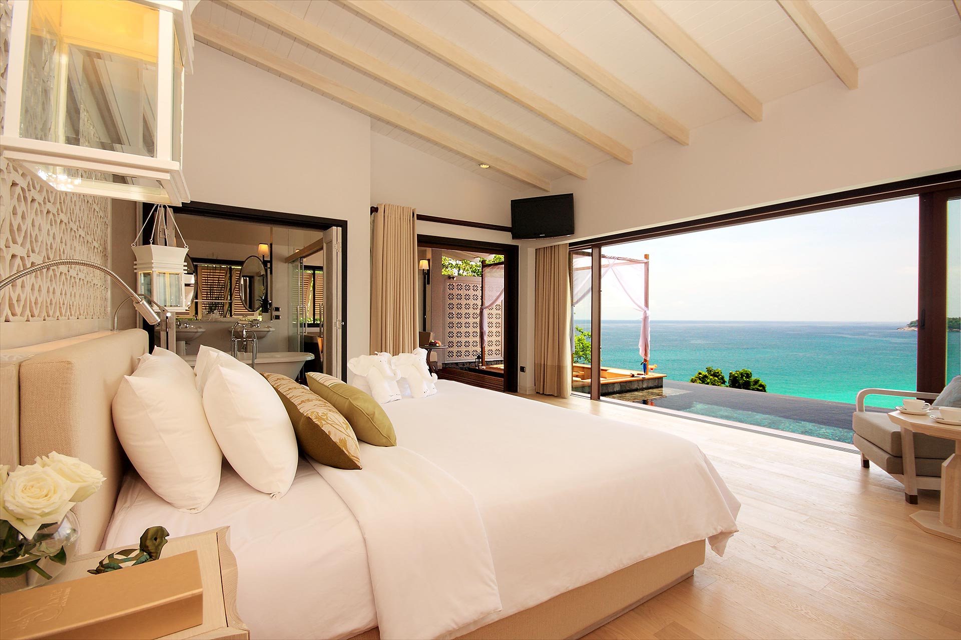 Hotel Room With Floor-To-Ceiling Windows And Ocean View