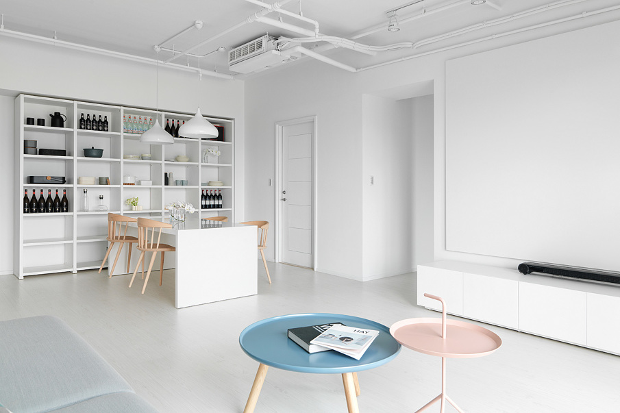 White Interior With Pastel Coffee Table