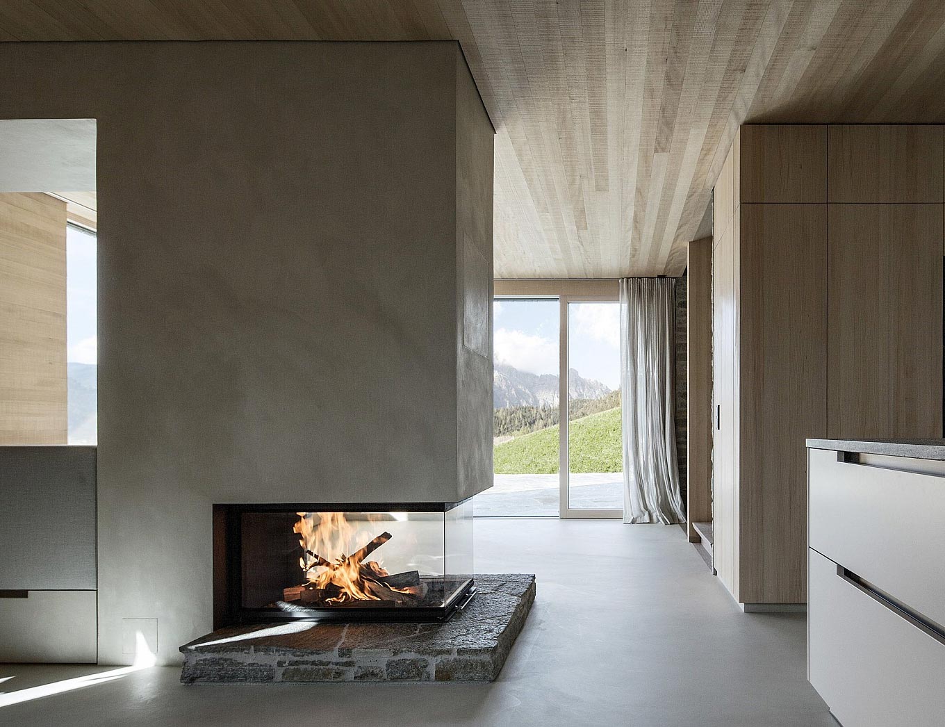 Minimalist Concrete Fireplace In A Striking Home Situated In The Alps