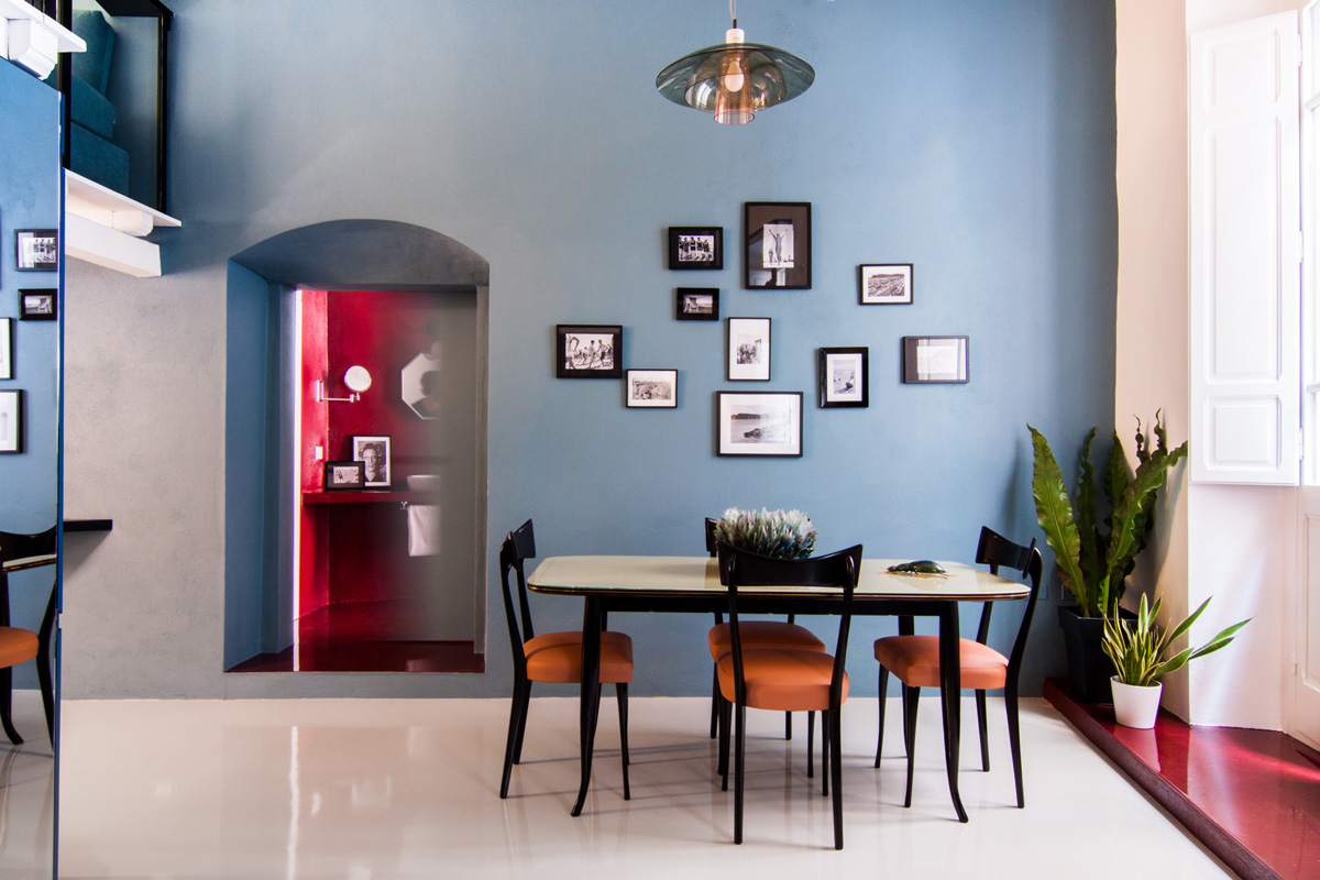 Dining Area With Blue Featured Wall