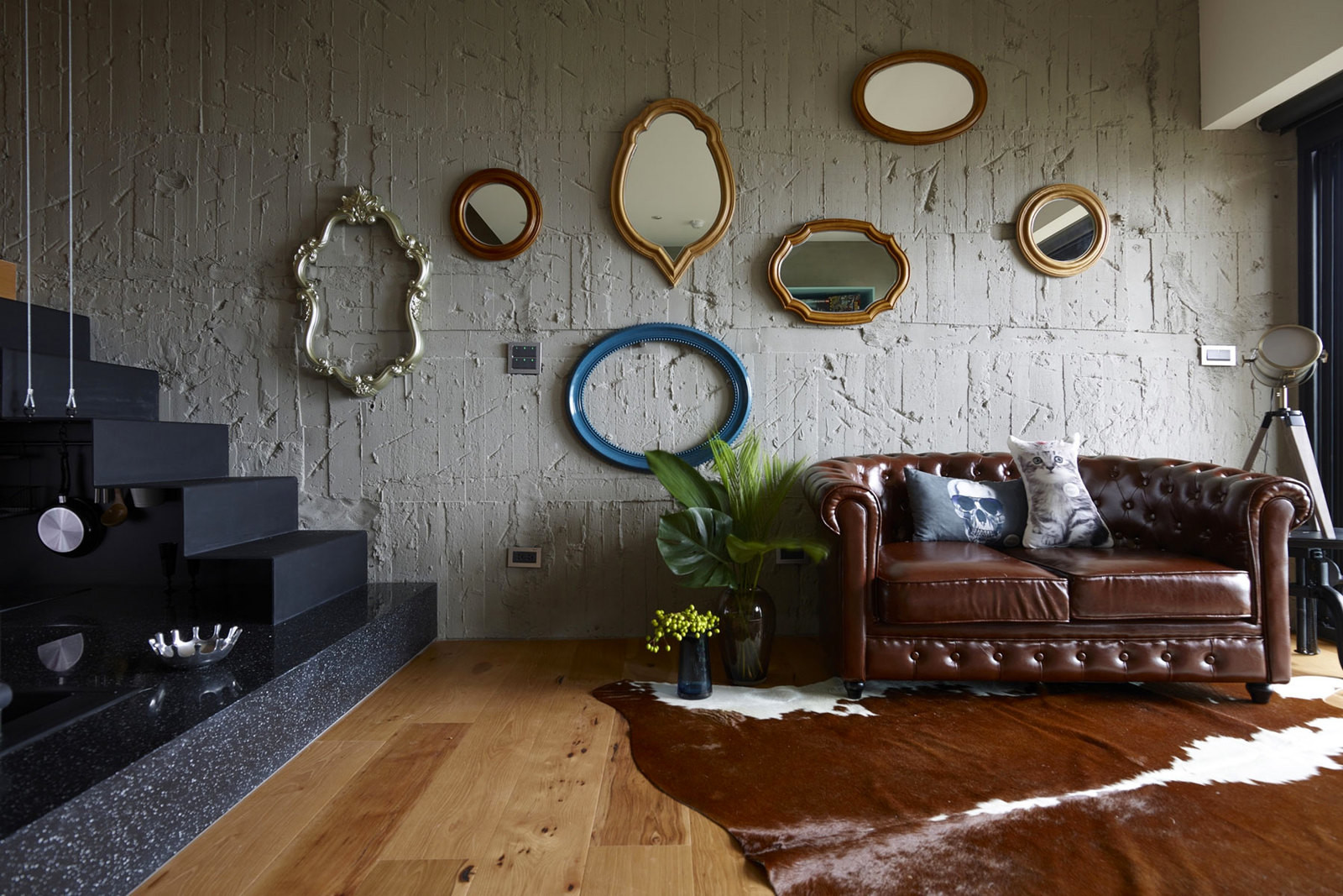 Eclectic Living Room With An Exposed Concrete Wall