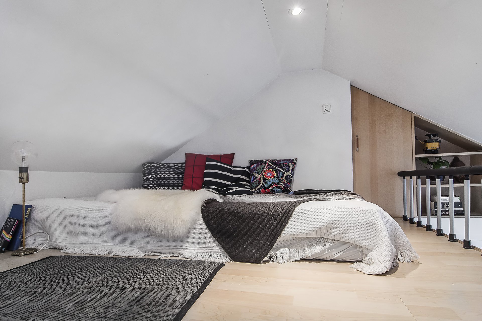 Attic Bedroom In A Black And White Loft