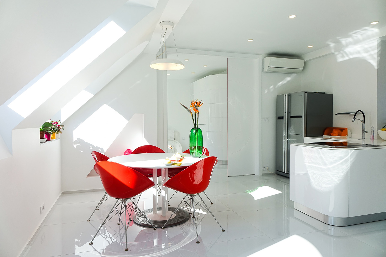 White Interior With Red Chairs