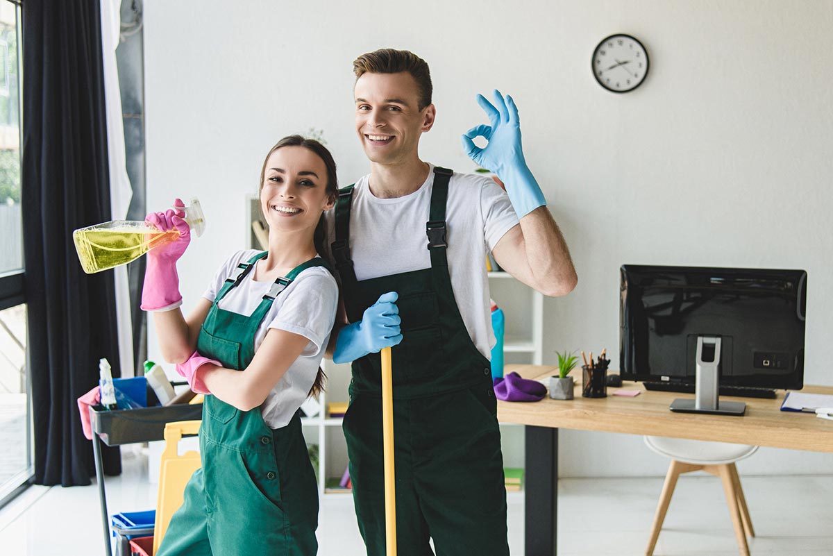 Happy Couple Cleaning Their Home