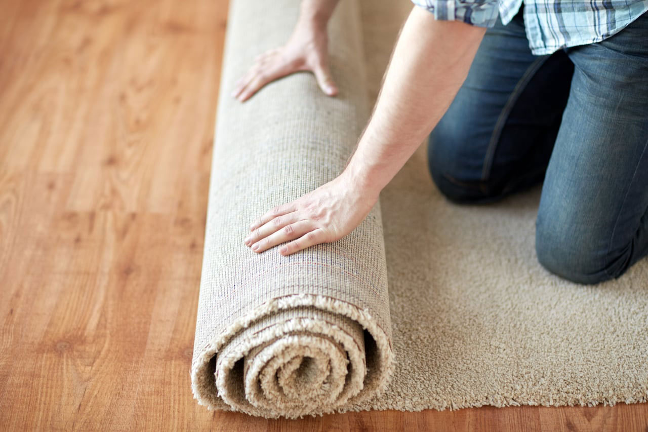 Laying A Carpet At Home