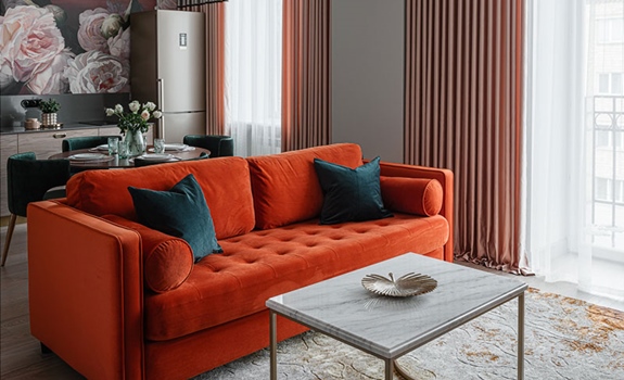 A Modern Apartment with Vibrant Pops of Orange