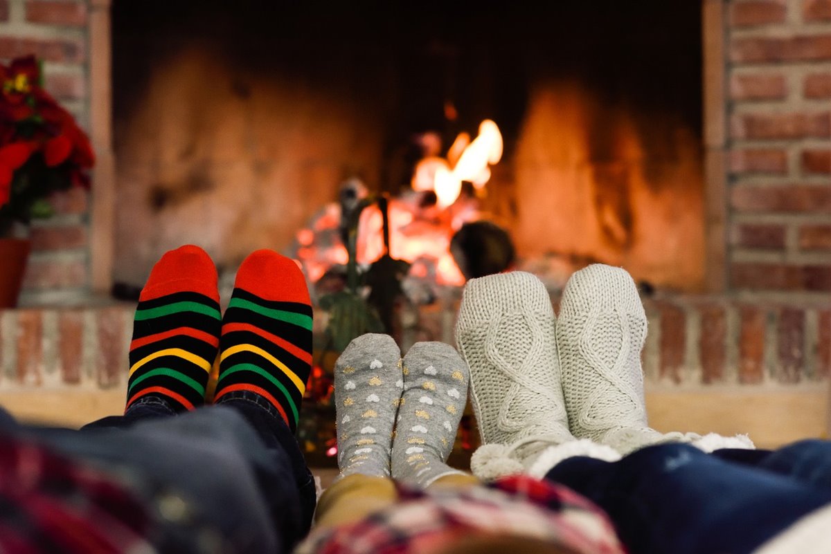 Cozy At Home In Front Of The Fireplace