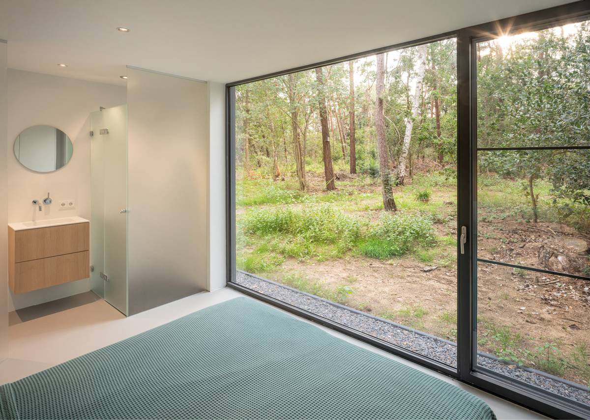 Spacious Bathroom With A Forest View