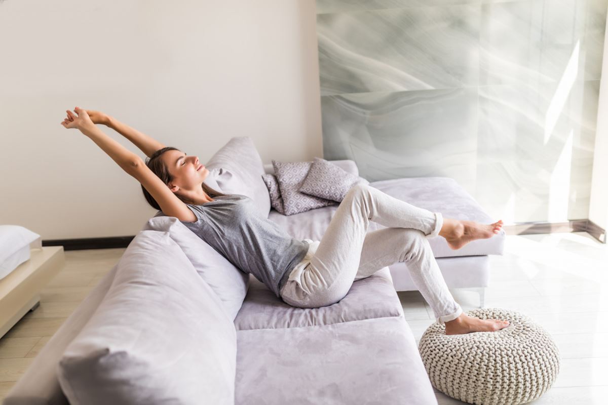 Woman Enjoying Clean Air At Home